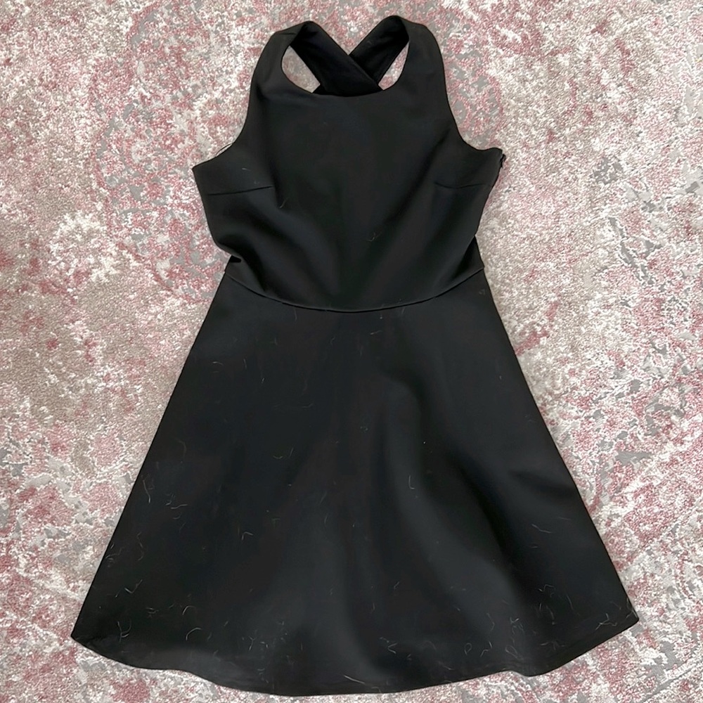 Black A-Line Mini Dress with pockets and open back
